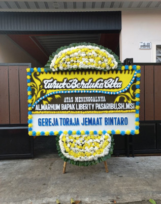 Papan Bunga Duka di Aramo